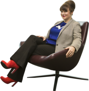 smart lady sat in chair - red boots