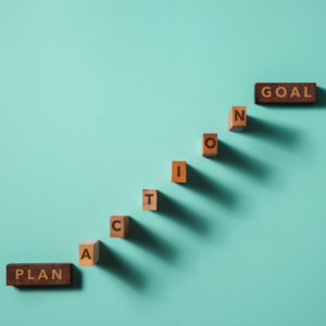 graphic of a plan with steps spelling action up to goal at the top