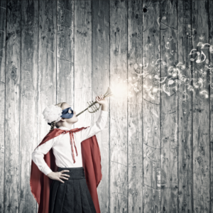 young girl in a school uniform, cape and eye mask blowing a trumpet into the air