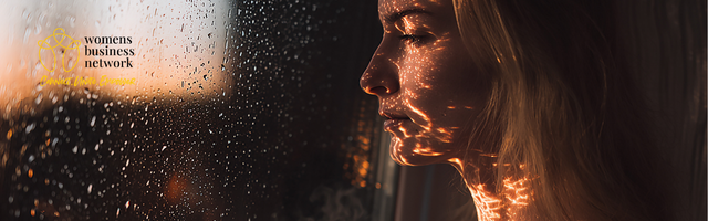 Side profile of lady looking out of the window